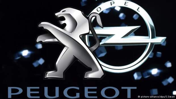 Эмблемы Peugeot и Opel 