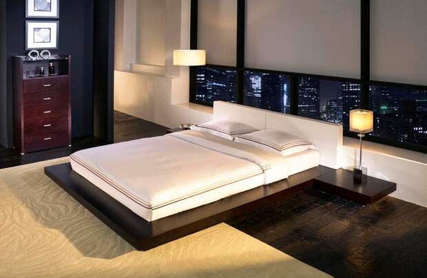 Прекрасный декор спальной в сдержанных тонах и с оригинальной кроватью.