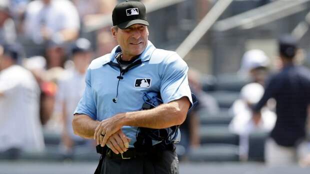 Angel Hernandez on the field before the start of a game.