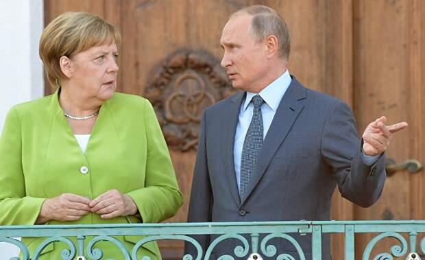 Президент РФ Владимир Путин и федеральный канцлер ФРГ Ангела Меркель во время встречи в резиденции правительства ФРГ Мезеберг. 18 августа 2018