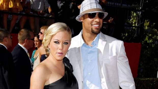 Kendra Wilkinson and Hank Baskett pose together in a 2009. Wilkinson announced her split from Baskett on Friday, April 6, 2018.