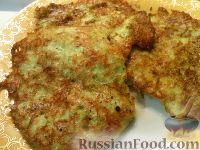Фото к рецепту: Кабачковые оладьи с сыром и чесноком