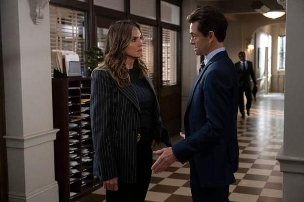 Benson and Price talk in the hallway on Law & Order Season 24 Episode 2