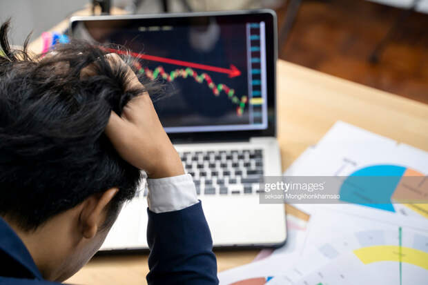 Stock trader tearing Stock trader tearing