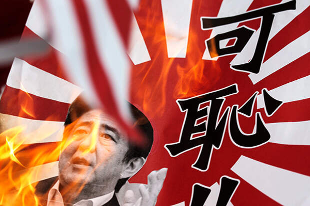 A rising sun flag with an image of Japanese Prime Minister Shinzo Abe and Chinese characters which reads "shame" is burnt during an anti-Japan protest outside the Japanese Consulate in Hong Kong September 15, 2013. The United States hopes that tentative diplomatic engagement between China and Japan amid their dispute over a group of islands in the East China Sea is successful as escalation is in nobody's interest, a senior U.S. diplomat said on Saturday. Wednesday marks the 82nd anniversary of Japan's invasion of mainland China. REUTERS/Tyrone Siu (CHINA - Tags: POLITICS CIVIL UNREST) - RTX13LVZ