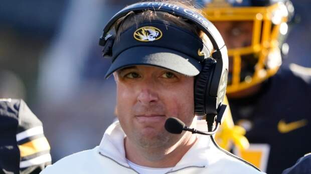Eli Drinkwitz watches on from the sidelines at a Missouri football game.