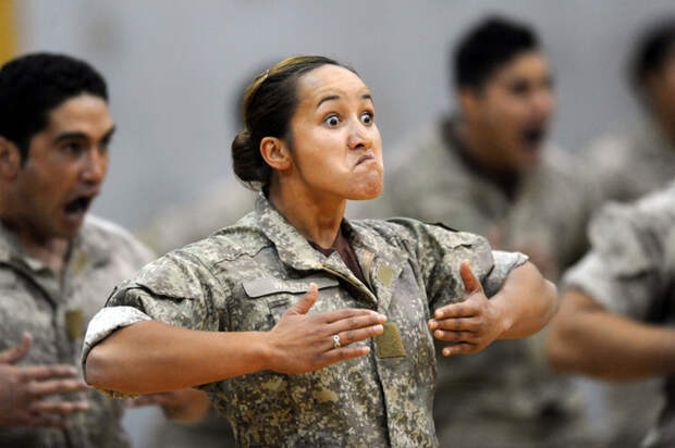 epa04745603 Army troops perform a Maori haka for Prince Harry at Linton Army Camp, Palmerston North, New Zealand, 13 May 2015. Prince Harry joined the New Zealand army to perform a rousing rendition of the army haka, beating his chest and stamping his feet, as soldiers in the front row put on ferocious expressions and poked out their tongues. The 30-year-old Prince was visiting the Linton Military Camp in the lower North Island while on an eight-day tour of the country. Dressed in his British army combat uniform, sleeves rolled up, Prince Harry wore a look of intense concentration as he performed the war dance of the country's indigenous Maoris. EPA/Ross Setford