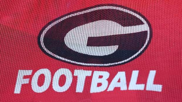 A UGA logo on football equipment.