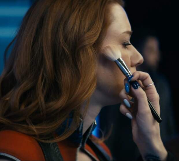 Firecracker gets her makeup done before the show.