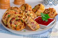 Фото к рецепту: Слоёные рулетики с ветчиной, сыром и чесноком