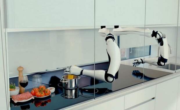 Робот готовит еду.