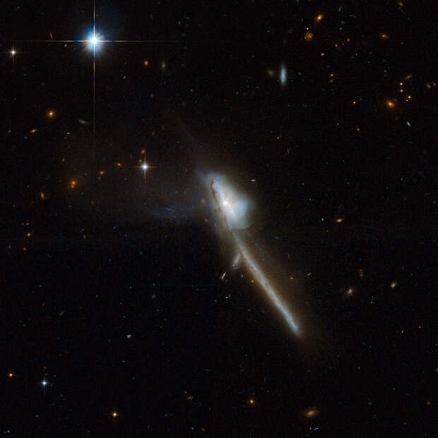 Недостаток металлов в ультраярких инфракрасных галактиках объяснили обилием пыли