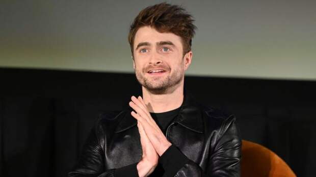 daniel radcliffe in a leather jacket