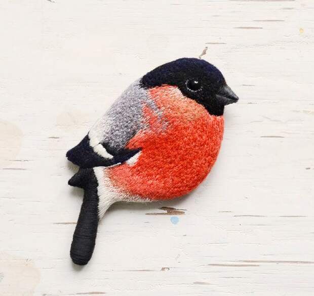 Can you believe this bird isn't real? Needle-felted and embroidered to perfection.