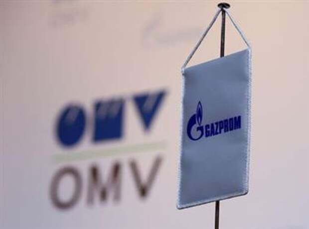 The logos of Austrian oil and gas group OMV and Gazprom are seen prior to a news conference in Vienna, Austria, December 14, 2016. REUTERS/Leonhard Foeger 