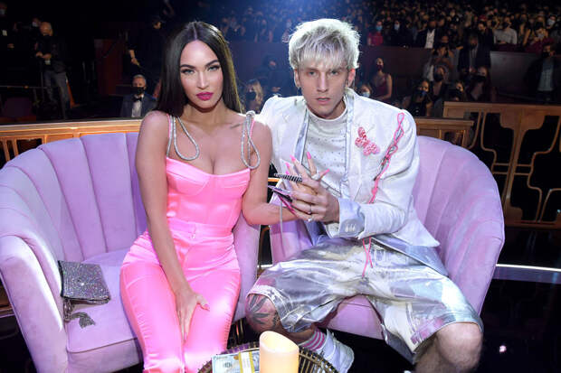 Megan Fox and Machine Gun Kelly posing for camera