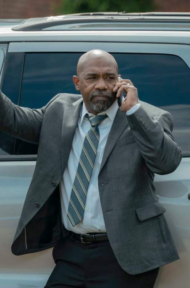 Kareem on the Phone - Mayor of Kingstown