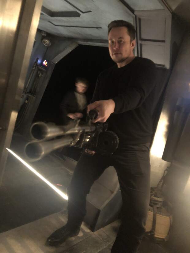 Elon Musk with a gun