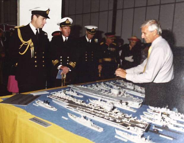 Prince Andew is presented with a match stick model of his ship by Philip Warren