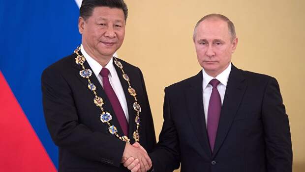 Си Цзиньпин призвал Россию и Китай вместе защищать международное право.
