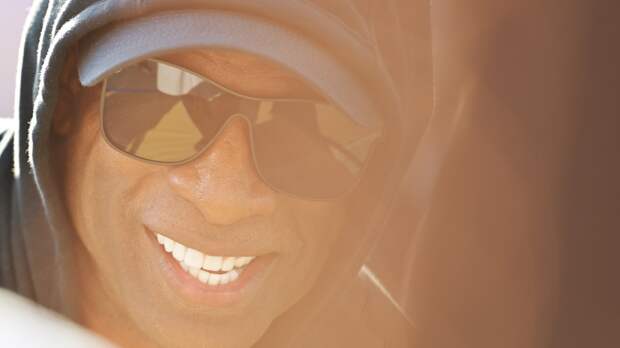 Deion Sanders smiling