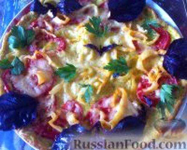 Фото к рецепту: Пицца из кабачков, с помидорами и сыром
