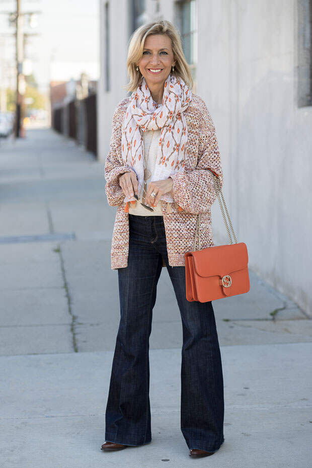 A spring look styled with a multi colored yarn womens cardigan and scarf