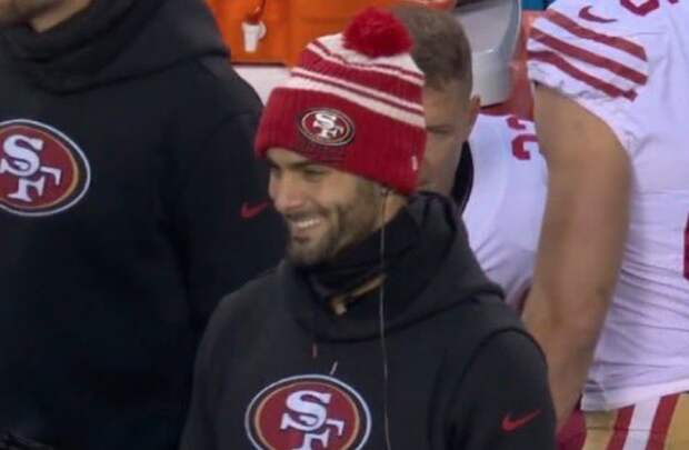Jimmy g smiling on the sidelines