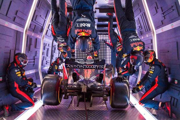 "Just catch the car while I change this wheel" Aston Martin Red Bull Racing’s mechanics pictured performing the Zero-G pit stop aboard an aircraft in Russia.