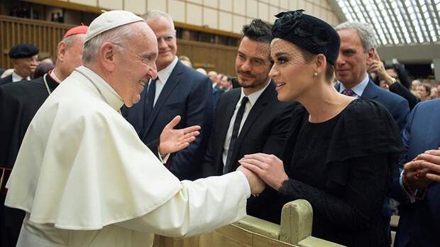 Pope Francis meets singer Kate Perry during the 