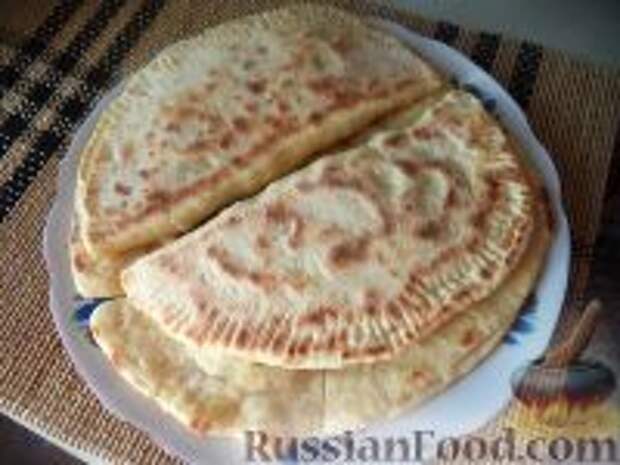 Фото к рецепту: Лепешки с зеленью и сыром (по-кавказски)