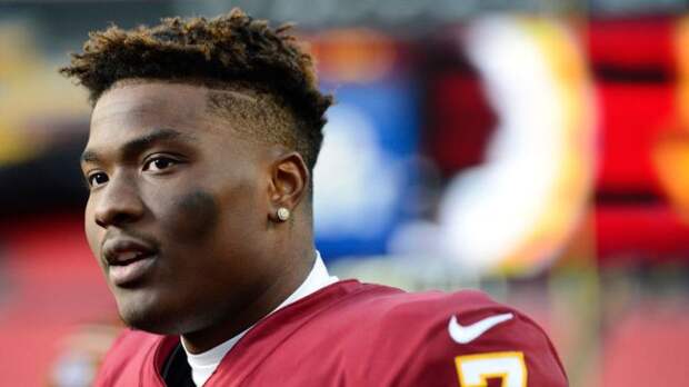 former nfl qb dwayne haskins in a redskins jersey