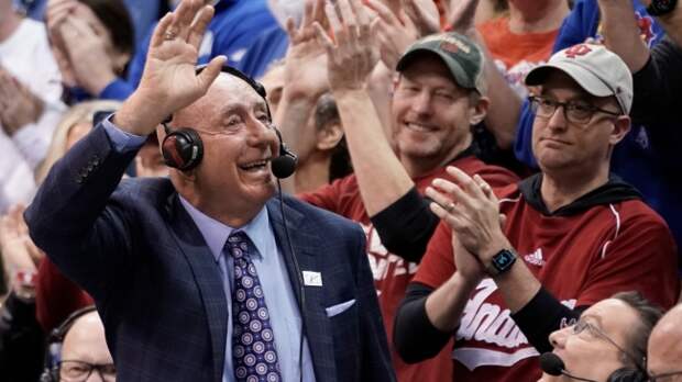 Dick Vitale waves to the crowd.
