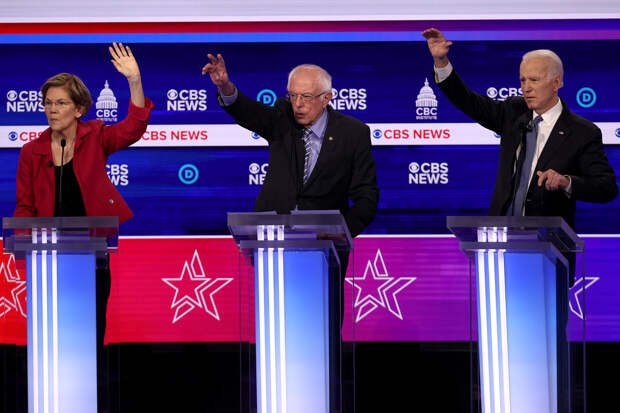 Senator Elizabeth Warren, Senator Bernie Sanders, and former Vice President Joe BidenSouth Carolina Democratic presidential primary debate | Photo Credits: Win McNamee, Getty Images