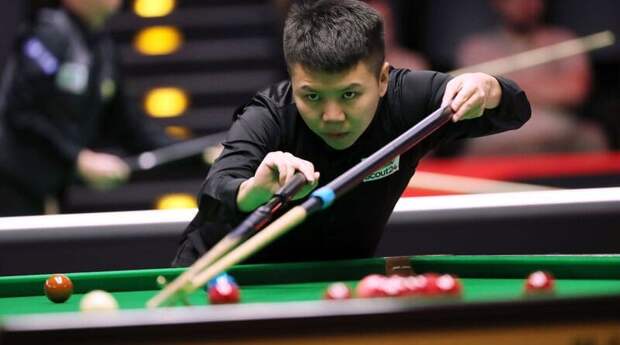 Чжоу Юэлун в первом матче основных этапов турнира в Сиане сыграет с Райаном Дэем (фото: WST)