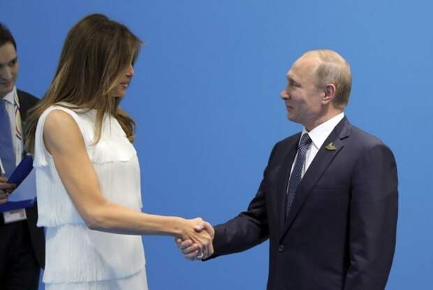 Первая леди США Меланья Трамп и президент РФ Владимир Путин на саммите G20