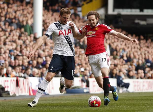 Tottenham's Eric Dier in action with Manchester United's Juan Mata.