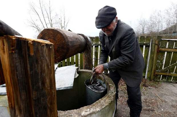 Жизнь в зоне отчуждения Чернобыльской АЭС (19 фото)