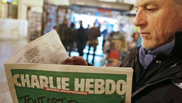 Французский сатирический еженедельник Charlie Hebdo. Архивное фото Французский сатирический еженедельник Charlie Hebdo. Архивное фото