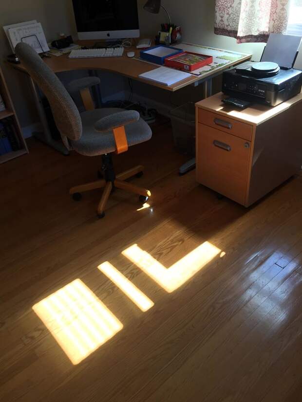 The Light And Shadow In My Office Spells Out 'Oil'