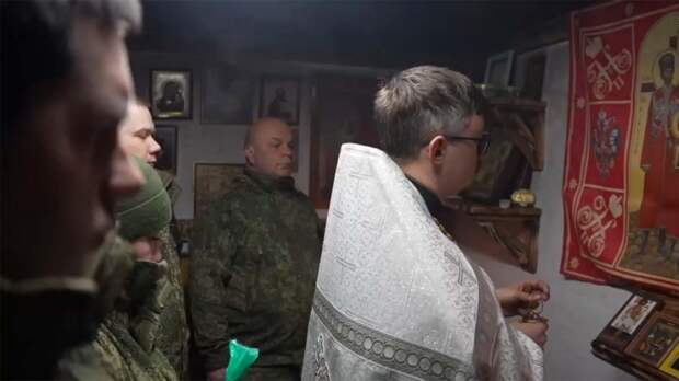 Благодатный огонь из Иерусалима доставили к бойцам в ДНР военным бортом