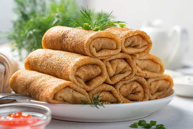 Роспотребнадзор посоветовал есть на Масленицу не больше трех блинов за раз