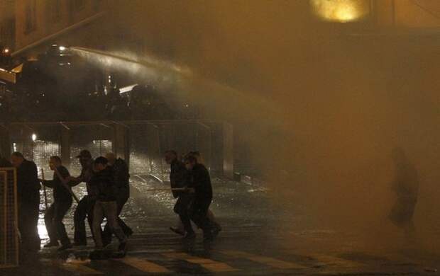 Police use water cannon during clashes with protesters in Tbilisi