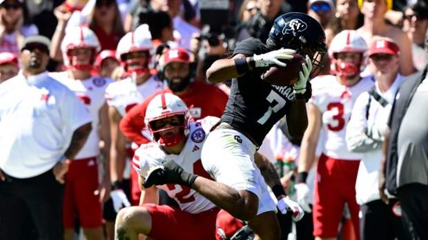 Cam'Ron Silmon-Craig intercepts a pass during a game between Colorado and Nebraska.