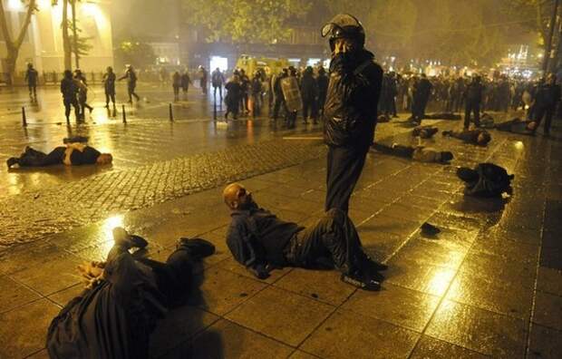 Police detain protesters during clashes in Tbilisi