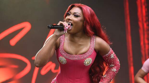 Megan Thee Stallion rapping on stage