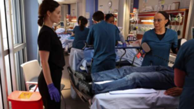 Horizontal photo of Lenox overseeing patient care during a mass casualty event on Chicago Med Season 10 Episode 1