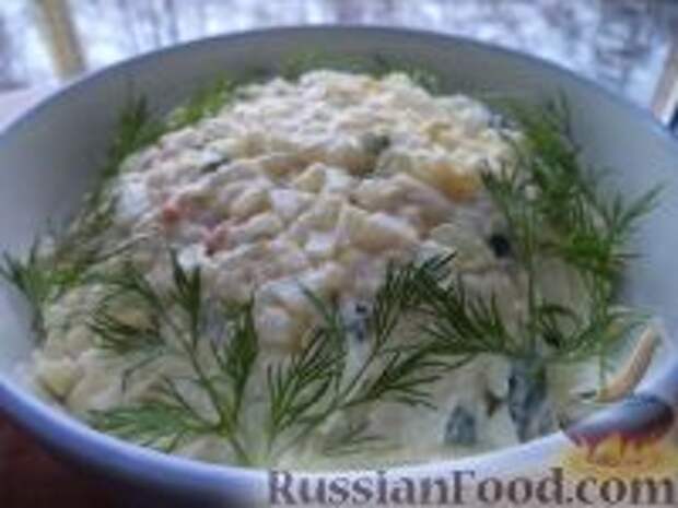 Фото к рецепту: Салат из кальмара с яйцами и рисом