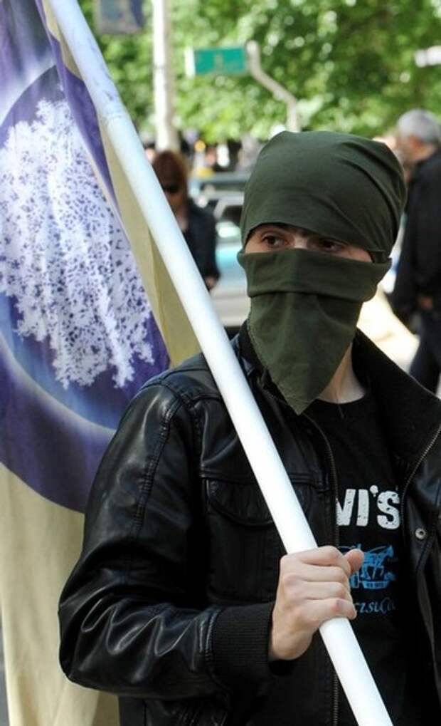 A masked Georgian opposition activist at