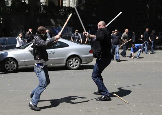 Opposition supporters clash with unidentified men in Tbilisi